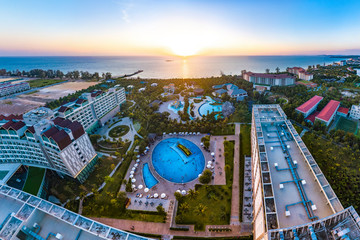 Wall Mural - Coastal Resort Scenery of Phu Quoc Island During Sunset, Vietnam, a Tourism Destination for Summer Vacation in Southeast Asia, with Tropical Climate and Beautiful Landscape. Aerial View.