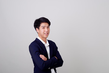 Young Asian businessman on white