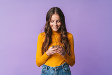 Image Of Young Beautiful Woman Smiling And Holding Cellphone