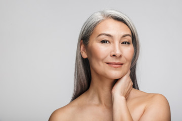 beauty portrait of an attractive mature topless woman