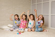 © producer - Group of kid sitting on floor together. four little girls have fun . friendship concept