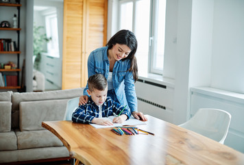 Wall Mural - homework teaching education mother children son familiy childhood