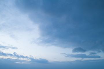 Wall Mural - Beautiful sky with stretched clouds during twilight.