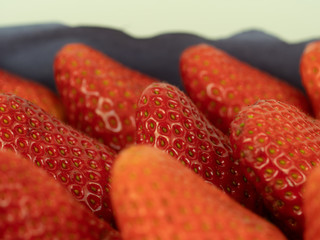 background from freshly harvested strawberries, closeup