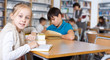 © JackF - Preteen girl in school library