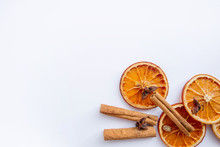 Dry Oranges On White Background With Cinnamon And Star Anise.  Mulled Wine Set