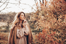 Young Woman In Autumn Park  
