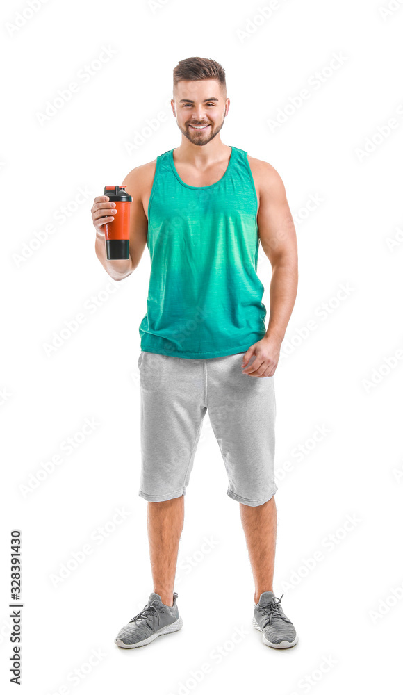 Sporty man with protein shake on white background