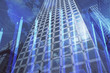 © peshkova - Forex chart on cityscape with tall buildings background multi exposure. Financial research concept.
