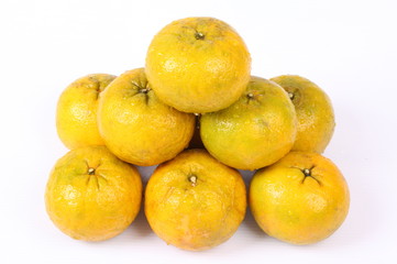 Fresh Oranges Harvest isolated on white background.