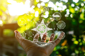 Technology, hand holding with environment Icons over the Network connection on green background.