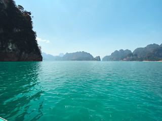 The ocean and the island, the sun and the waves in the evening