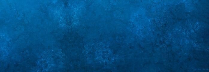 Dark slate background toned classic blue color. Long banner. Old textured background