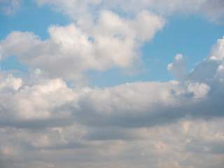 Wall Mural - the movement of dark clouds in the blue sky