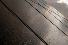 Solar Panel With Rain Drops On It. Solar Panel In Rain.
