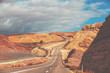 © vvvita - Driving a car on mountain Israel road. Desert landscape. Empty road. The road runs along the border of Israel with Egypt. View from the car of the mountain landscape on a sunny day. Israel