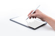 © urmosilevente - Man writing on a tablet with white stylus