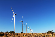 Desert Hill Wind Turbine Farm Bright Blue Sky
