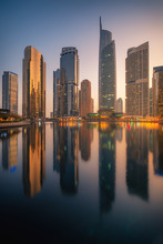 Amazing Architecture Parallel Buildings. Cloudy Night Sky. Luxury Travel Inspiration. Dubai Jumeirah Lake Towers.