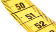 © michaklootwijk - Close-up of a yellow measuring tape isolated on white - 51