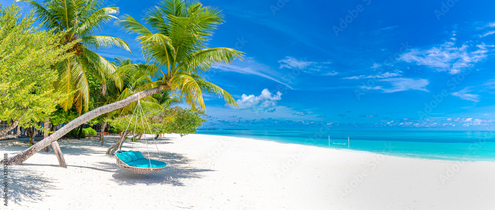 Tropical beach panorama as summer landscape with beach swing or hammock and white sand and calm sea for beach banner. Perfect beach scene vacation and summer holiday concept. Boost up color process - obrazy, fototapety, plakaty 