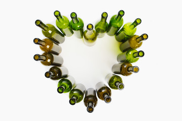 Wall Mural - empty wine bottles heart shape, white background