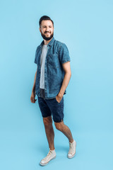 Sticker - Hipster man in summer clothes on a blue background