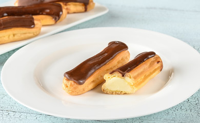 Wall Mural - Eclairs with chocolate topping