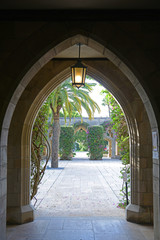 Wall Mural - Courtyard of Bethesda-by-the-Sea Church. Church of Bethesda by the Sea is an Episcopal Church with gothic revival style in Palm Beach, Florida FL, USA.