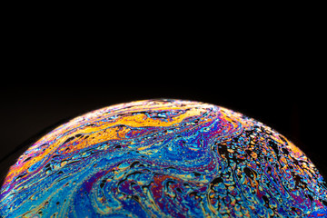 colorful soap bubble ball with black background