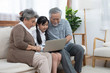 © mkitina4 - Little granddaughter teach senior elder to surf internet using computer and technology& modern lifestyle.