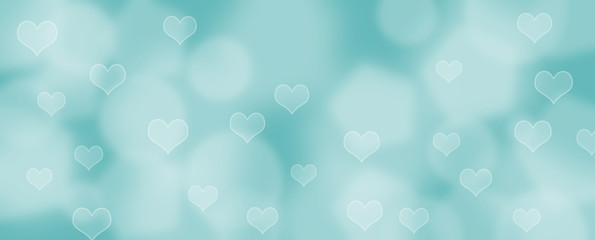 Abstract blue bokeh banner background with hearts - birthday, father's day, valentine's day panorama - blurry bokeh circles and hearts on a blue background.