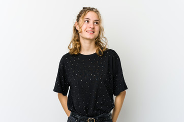 Young caucasian woman on white backrgound relaxed and happy laughing, neck stretched showing teeth.