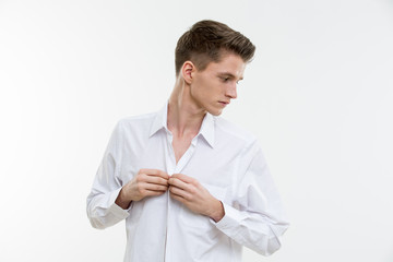 Portrait of young attractive man on white background