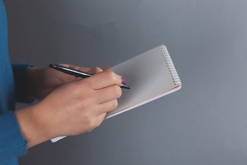 woman hand pen with notepad