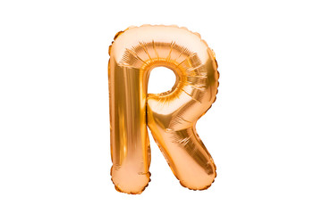 Letter R made of golden inflatable helium balloon isolated on white. Gold foil balloon font part of full alphabet set of upper case letters. Celebrating decoration