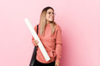© Asier - Young woman studying architecture looks aside smiling, cheerful and pleasant.