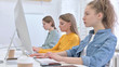 © stockbakers - Woman with Curly Hairs Working on Computer