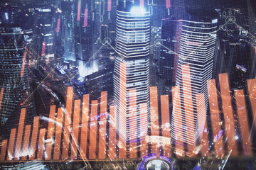 Financial chart on city scape with tall buildings background multi exposure. Analysis concept.