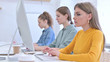 © stockbakers - Creative Female Team Working on Desktop and Laptop