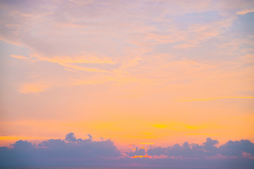 Wall Mural - Colorful sunset sky with cloud above sea shore