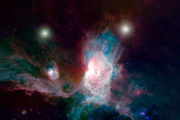 a beautiful nebula of different colors, with stars and galaxies. elements of this image were furnish