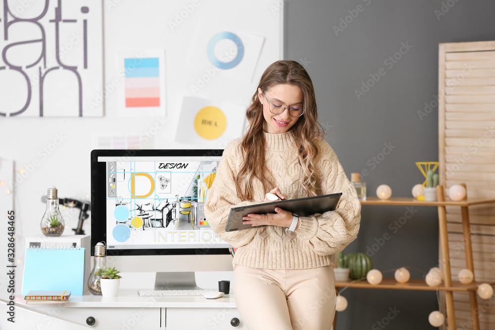 Portrait of female interior designer in office Stock Photo | Adobe Stock