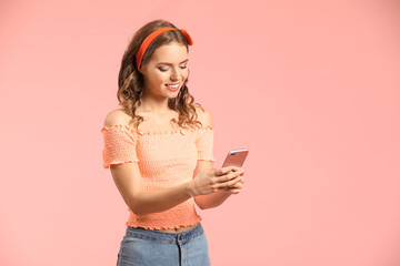 Sticker - Young woman with mobile phone on color background