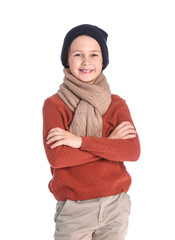 Poster - Cute little boy in winter clothes on white background