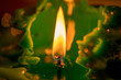 macro image of a  green candle flame burning