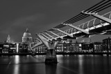Fototapeta  - St Paul's Cathedral along the length of Millennium Bridge, Black and White