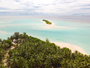 Wall Mural - Aerial drone view of picture perfect beach and turquoise lagoon on small tropical island on Maldives.