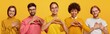 © wayhome.studio  - Horizontal shot of happy women and men show heart gesture, express love, say be my valentine, keep hands on chest, feel thankful, isolated on yellow background, confess in truthful feelings.