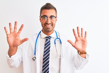 Canvas Print - Young handsome doctor man wearing stethoscope over isolated background showing and pointing up with fingers number ten while smiling confident and happy.